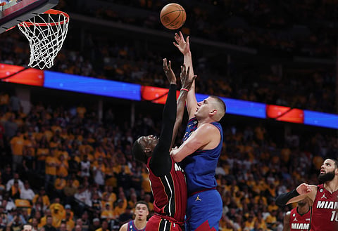 MATTHEW STOCKMAN/AGENCE FRANCE-PRESSE
NIKOLA Jokic delivers a triple-double performance to power the Denver Nuggets to a 104-93 win over the Miami Heat in Game 1 of their NBA Finals best-of-seven series.
