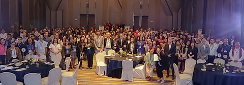 Summit participants pose for a group shot. | PHOTOGRAPHS COURTESY OF USAID FISH RIGHT