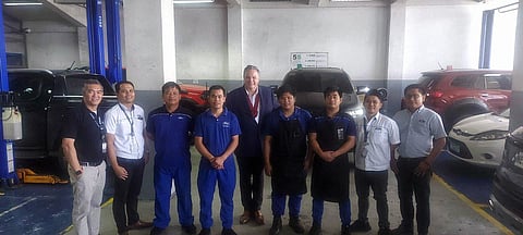 Michael Breen of Ford Philippines (center, fifth from rigfht) with LausGroup trainees and staff at Ford Metro Baguio. | photograph courtesy of LGC