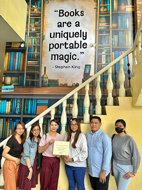 Turnover of books for Dr. Artemio E. Natividad Elementary School. | Photograph courtesy of Megaworld Lifestyle