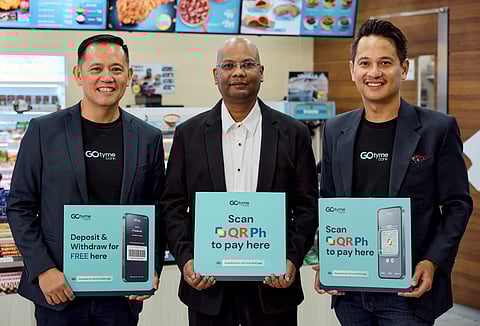 GoTyme co-CEO Albert Tinio, Uncle John's general manager R Suresh Ramalinggam, and GoTyme CMO Raymund Villanueva launched the pay via QR and free deposit. | photograph courtesy of  GoTyme