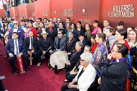 LOS ANGELES, CALIFORNIA - 16 OCTOBER: Cast and crew including Chad Renfro, Scott George, Kathryn Redcorn, Julie O'Keefe, Addie Roanhorse and Janis Carpenter attend Apple TV+'s "Killers Of The Flower Moon" premiere at Dolby Theatre on 16 October 2023 in Los Angeles, California.   (Photo by Frazer Harrison / GETTY IMAGES NORTH AMERICA / Getty Images via AFP)