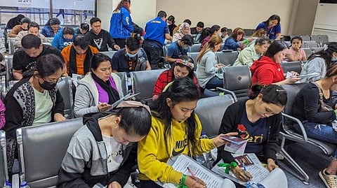 Immigration chief honors local, migrant workers