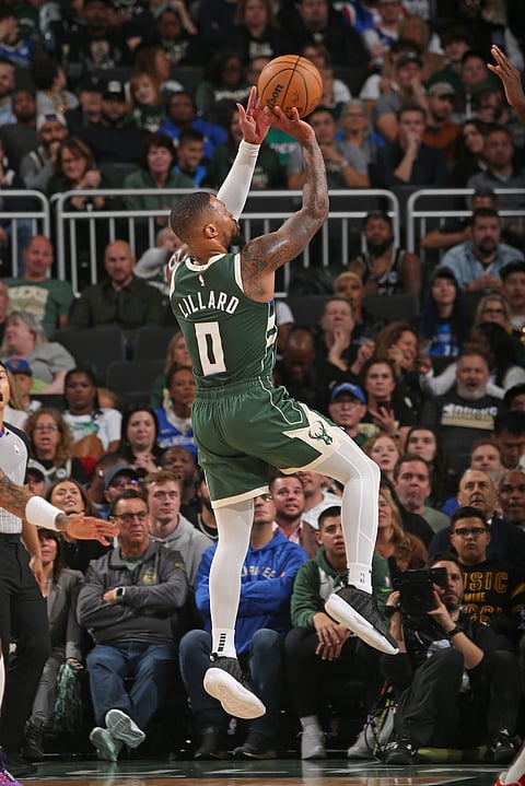 DAMIAN Lillard delivers a record-setting 39 points to power the Milwaukee Bucks to a 118-117 win over the Philadelphia 76ers. | GARY DINEEN/
AGENCE FRANCE-PRESSE
