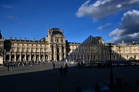 A spokeswoman for the Louvre, the largest museum in the world, told AFP it had "received a written message stating that there was a risk to the museum and its visitors". (Photo by MIGUEL MEDINA / AFP) 