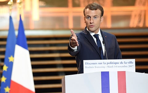 French President Emmanuel Macron waded into a culture war debate on Monday, saying France should "not give in to fashionable trends" as he appeared to back a bill to ban "inclusive language". (Photo: FRANCOIS LO PRESTI/AFP/Getty Images)