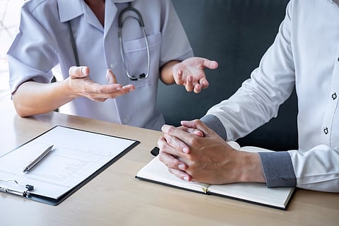 A doctor consults with a patient, examines symptoms, presents findings, and recommends a treatment plan, illustrating a healthcare and medical concept.