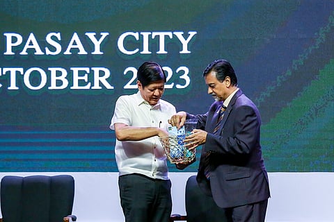 Sample only President Ferdinand R. Marcos Jr. receives a low glycemic index rice from International Rice Research Institute Interim Director General and Deputy Director General Ajay Kohli during the 6th International Rice Congress at the Philippine International Convention Center in Pasay City on Monday. | Noel Pabalate/PPA POOL