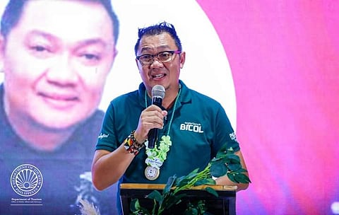 DOT Region 5 director Herbie Aguas having a speech during the Bicol leg of the Philippine Experience Program of the Department of Tourism. Photo by DOT