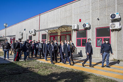FILE PHOTO: A view taken on 15 December 2020 in Lamezia Terme, Calabria, shows Italy's Minister of Justice Alfonso Bonafede (5th R) touring with officials, police, and reporters a new bunker room built for the upcoming 'Rinascita-Scott' maxi-trial in which more than 350 alleged members of Calabria's 'Ndrangheta mafia group and their associates go on trial. (Photo by Gianluca CHININEA / AFP)