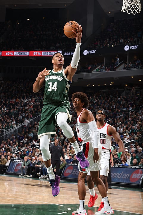 GIANNIS Antetokounmpo and the Milwaukee Bucks rally from a 26-point deficit to pull off a 108-102 victory over the Portland Trail Blazers.  | JEFF HAYNES/AGENCE FRANCE-PRESSE