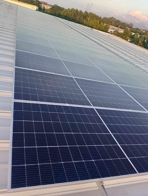 Solar roofdeck at Alfamart’s distribution center in Silang, Cavite is part of the retail chain's renewable energy shift. | Photograph courtesy of Alfamart