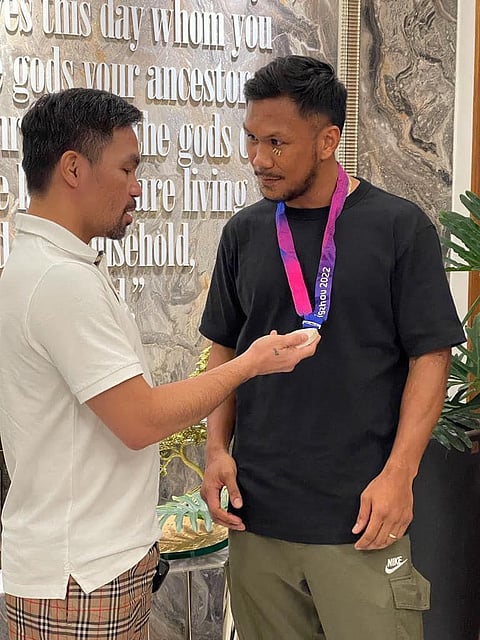 EIGHT-division champion Manny Pacquiao is cooking up a professional bout for Olympian Eumir Marcial in Manila before he heads to Paris for the Summer Games. | PHOTOGRAPH COURTESY OF MP Promotions