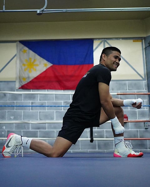 Marlon Tapales heats up his Baguio City training camp by banging bodies with two sparmates for a total of six rounds. | Photograph courtesy of SanMan Boxing