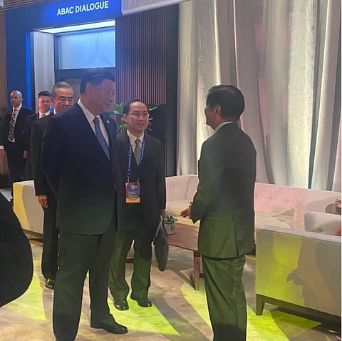 Marcos and Xi’s pull aside meeting. 📸@bongbongmarcos | Instagram