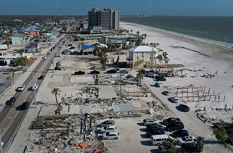 FORT MYERS BEACH, FLORIDA - 25 JANUARY: In this aerial view, cleared lots are all that remain of some homes and businesses that were destroyed by Hurricane Ian on 25 January 2023 in Fort Myers Beach, Florida. The process of rebuilding continues four months after the hurricane passed.    (Photo by JOE RAEDLE / GETTY IMAGES NORTH AMERICA / Getty Images via AFP)