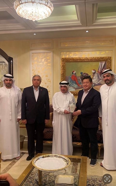 Abu Nader (center) received a Plaque of Appreciation from a Philippine business and diplomatic contingent in Dubai last week. Joining the said bestowing of the award are (from left to right) Emirati businessman Nasser Mohammadi; Philippine Ambassador to the Philippines Alfonso Ver, Philippine Special Envoy to Dubai for Trade and Investments Norman Vincent Wee, and Naji Mohammadi, also a businessman in Dubai. | Photograph courtesy of Philippine Supermarket Dubai