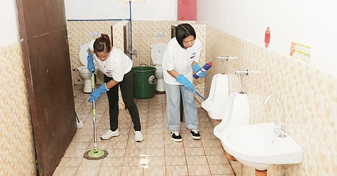 Domex volunteers cleaned the comfort room of Ricardo P. Cruz Sr. Elementary School, Taguig City, during ‘Brigada Eskwela’ 2023.