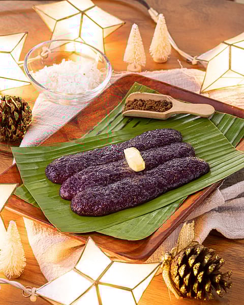 Merienda’s freshly made Puto Bumbong slathered with butter and sprinkled with muscovado. | Photograph courtesy of Pan de Manila