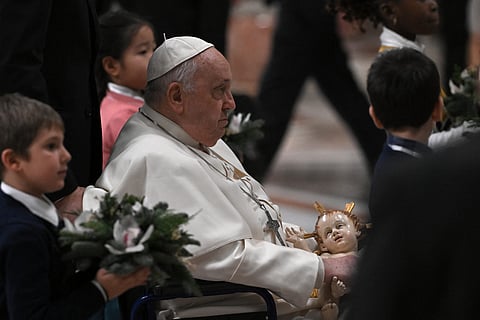 HOLDING an icon of Baby Jesus, Pope Francis celebrates Christmas Eve Mass at St. Peter’s Basilica, calling on nations to work for peace amid wars being fought in Ukraine and Israel. | Tiziana FABI/AGENCE FRANCE-PRESSE