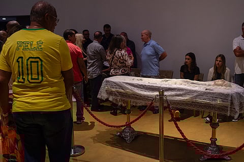 People attend the funeral service of the Brazilian football legend Mario Zagallo at the Brazilian Football Confederation (CBF) headquarters in Rio de Janeiro, Brazil, on January 7, 2024. Brazilians paid their last respects Sunday to football legend Mario Zagallo, after the four-time World Cup-winning player and coach died at age 92, the final member of one of the country's greatest footballing generations. (Photo by Tercio TEIXEIRA / AFP)