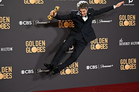 ‘Oppenheimer’ tops Golden Globes on bittersweet night for ‘Barbie’