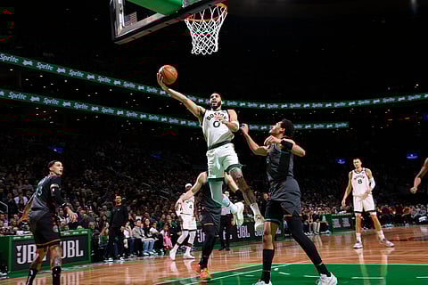 Jayson Tatum fires 35 points to power the Boston Celtics to a 133-129 win over the Washington Wizards in their NBA regular season game. | BRIAN BABINEAU/AGENCE FRANCE-PRESSE
