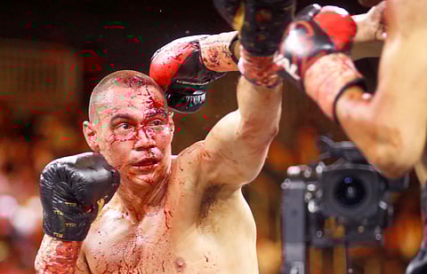 TIM Tszyu is a bloody mess as he battles Sebastian Fundora in their world junior middleweight title fight. Fundora prevailed via split decision to win the WBO junior middleweight and WBC crowns. | STEVE MARCUS/AGENCE FRANCE-PRESSE
