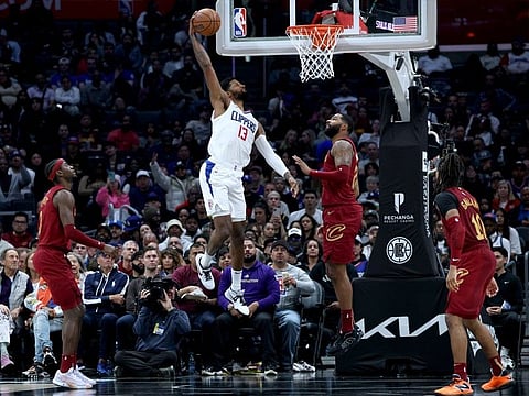 HARRY HOW/AGENCE FRANCE-PRESSE
PAUL George fires 23 of his 39 points in the fourth quarter to power the Los Angeles Clippers to a 120-118 win over the Cleveland Cavaliers in the NBA regular season.