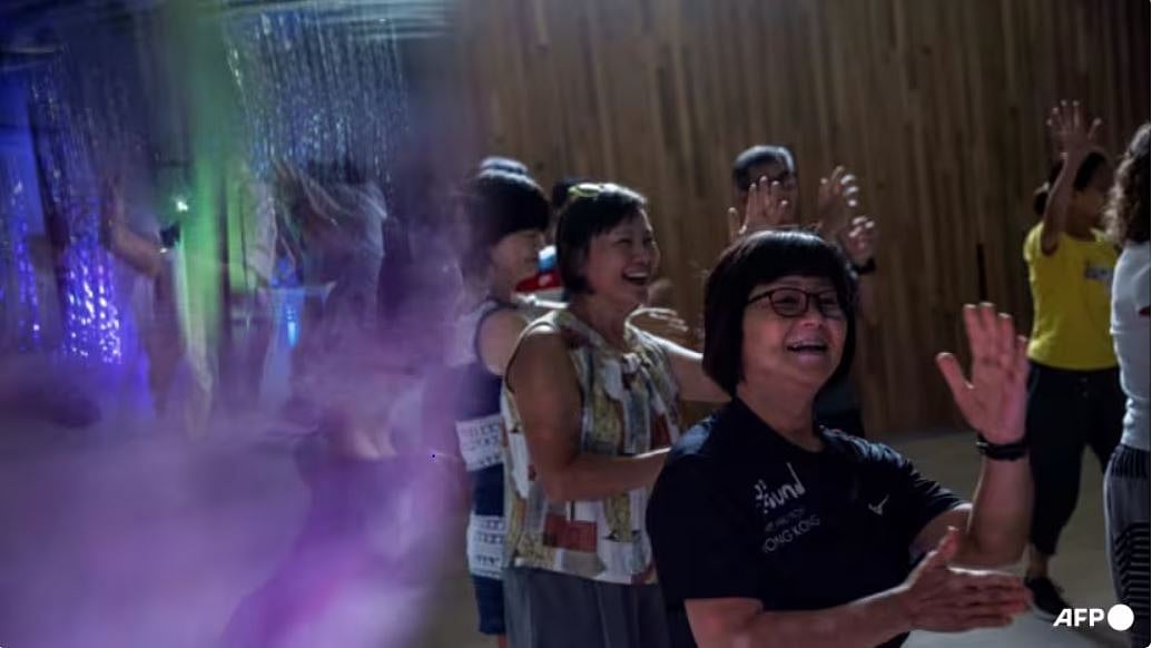 Disco, dogs help Hong Kong’s elderly out of post-Covid isolation