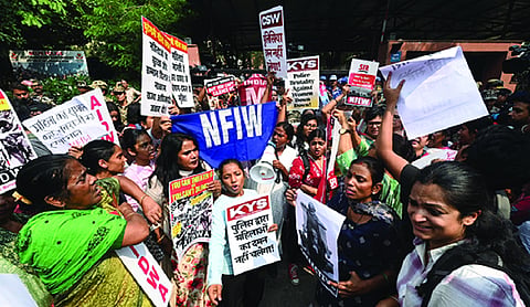 Women march to Delhi Police headquarters demanding action over assault