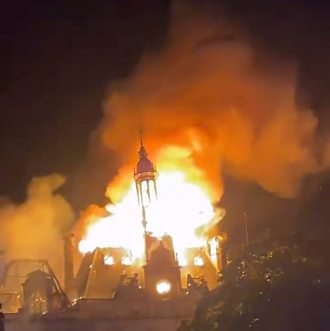 The historic town hall in Limoges was engulfed in flames as protests across France turned violent on October 17.