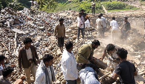 At least 20 soldiers were killed in a Houthi missile strike on a government military camp in southern Yemen. 