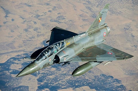 A French Mirage 2000D fighter jet crashed in eastern France, killing one crew member as the search for the second continues. 