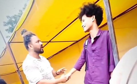 A screengrab from the viral video showing a man accused of making alleged racial remarks against a young man from Tripura.