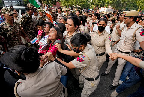 Delhi police detains protesters who are protesting against SIR