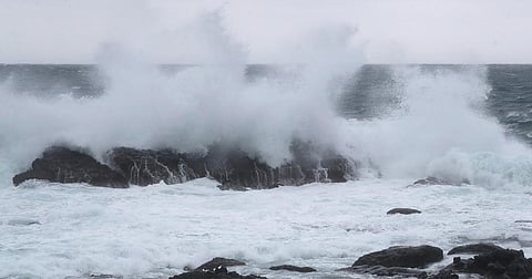 A high wave crashes ashore as Typhoon Champi hits Taiwan.
