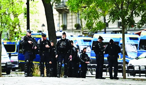 France deploys thousands of police as Paris march is restricted to city’s edge