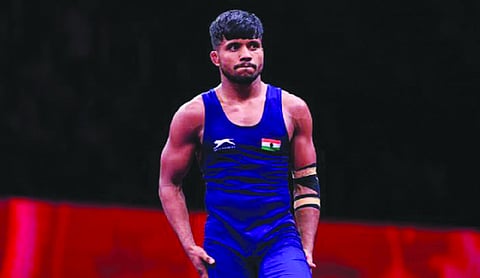 Lalit stays in medal race, three others bow out on opening day