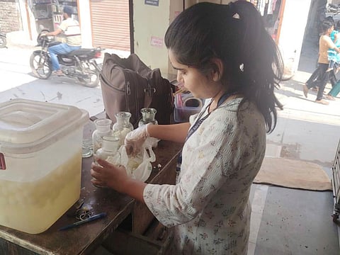 Images of sweets being dipped into unknown liquids on the streets of Delhi