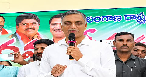 BRS senior leader T Harish Rao speaks at the Telangana Ration Dealers’ meeting in Gajwel.