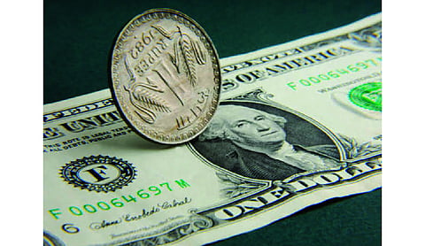 Rupee gains 2 paise to close at 95.26 against US dollar