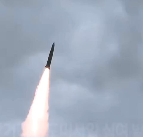 North Korea fires around 10 short-range ballistic missiles towards the sea off its east coast. 