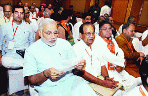 When to ride Modi tide, BJP in a fix