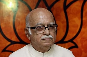 Advani quits all party posts