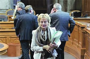Swiss Finance Minister Eveline Widmer-Schlumpf leaves a session