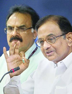 Chidambaram pledges more reforms ,  says 'do not panic'