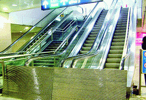 Manual baggage check, closed escalators at airport