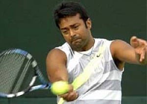 Paes, Bopanna advance in Wimbledon