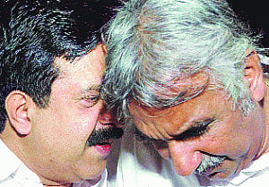 Chandy, Ramesh slug it out in open